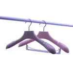 Woman's velvet suit coat hanger with non-slip strip