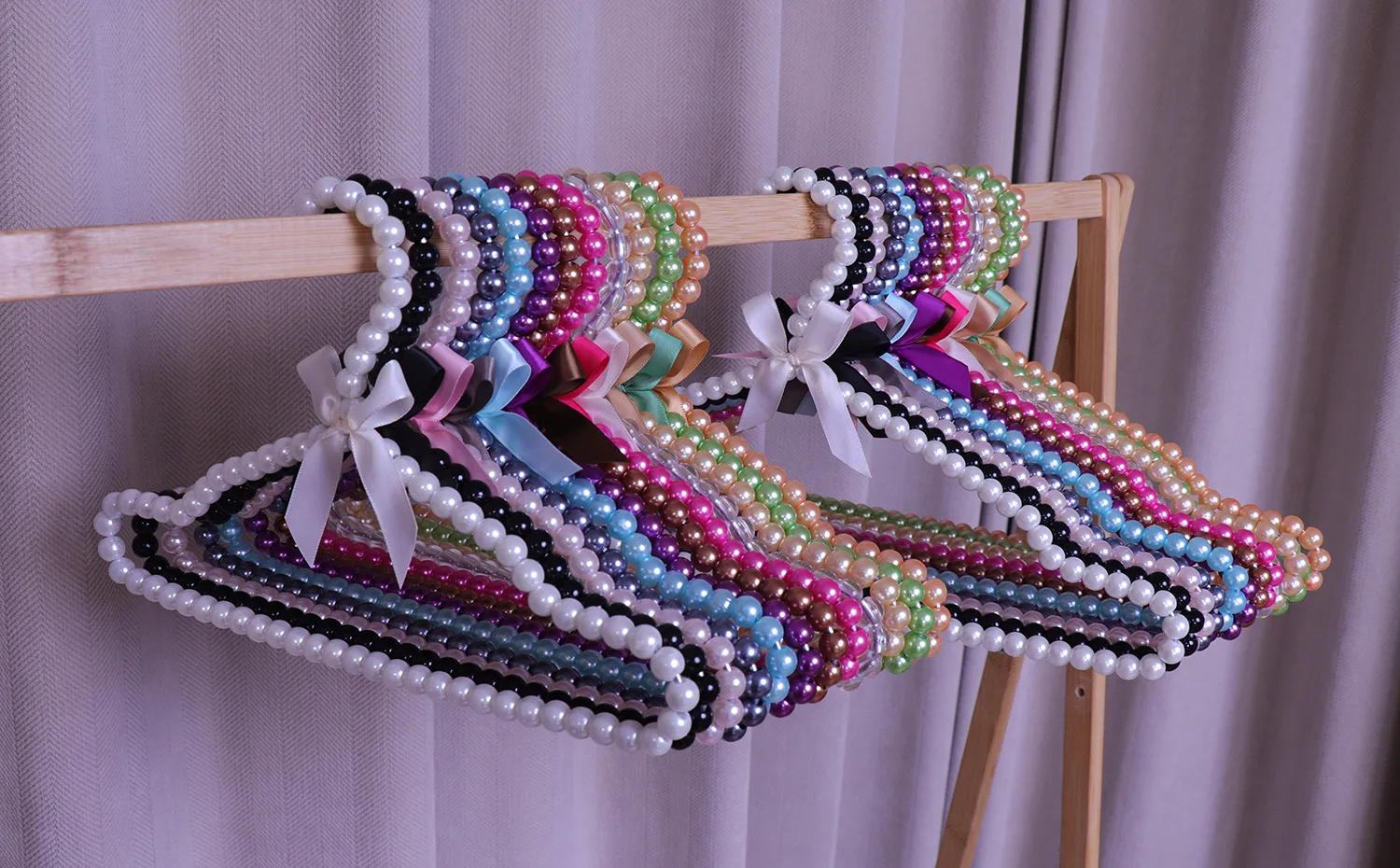 Support à perles pour vêtements d'enfants