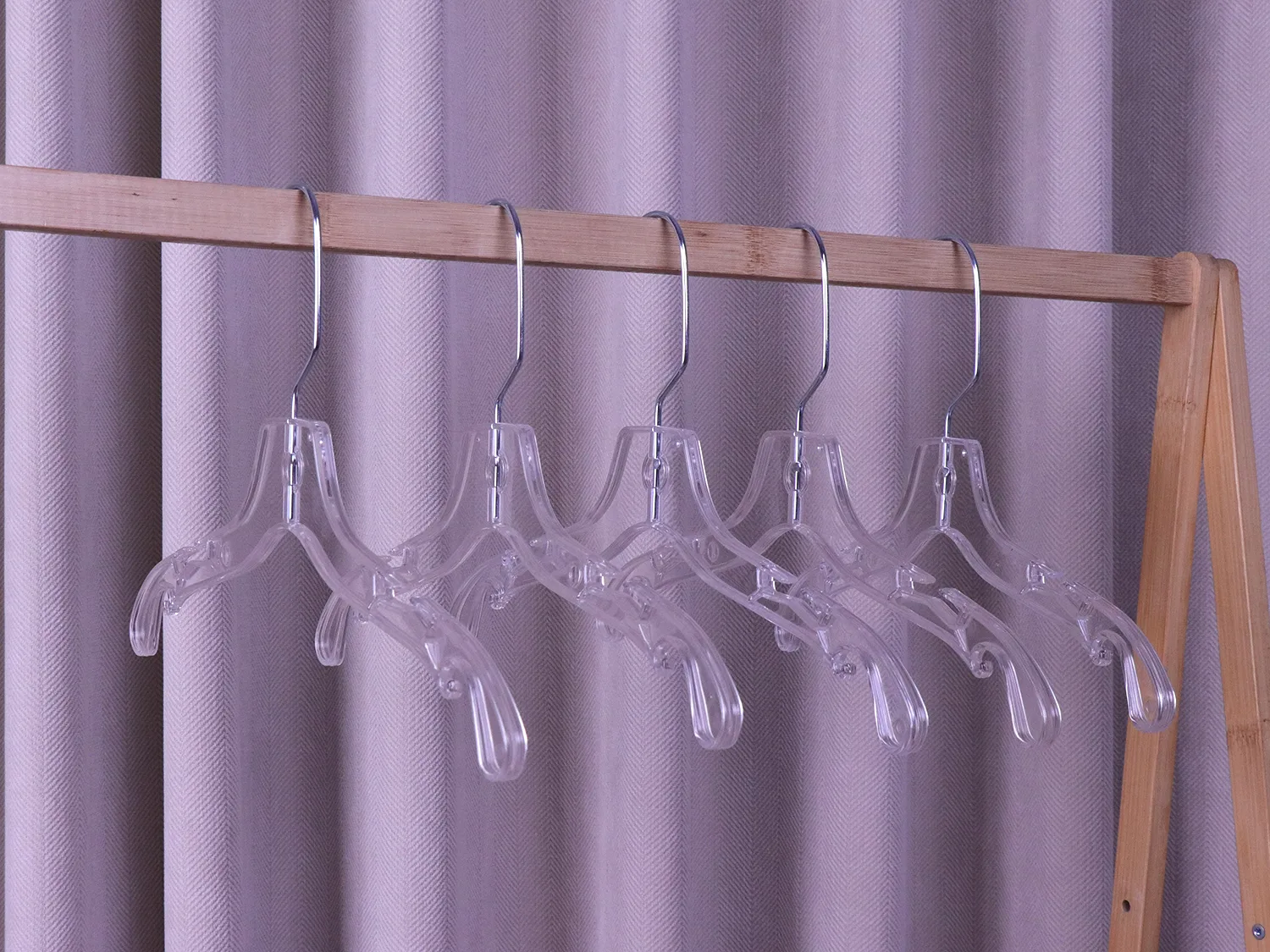 Colgador de abrigo transparente de alta calidad para boutiques
