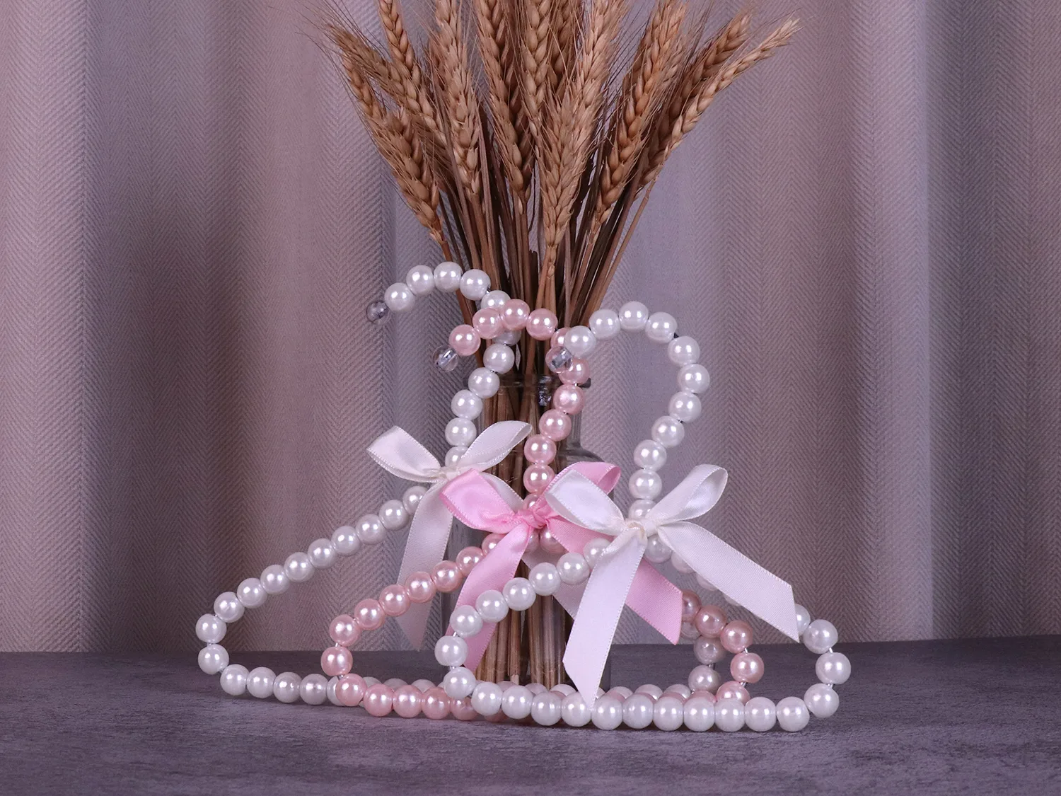 Chiffon bow detail on beaded baby hanger