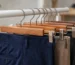 Wooden pant hangers with clips non slip bars and durable finishes for space saving closet organization and gentle fabric care
