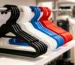 plastic clothes hangers wholesale - stack of colored plastic hangers for retail and hotel use